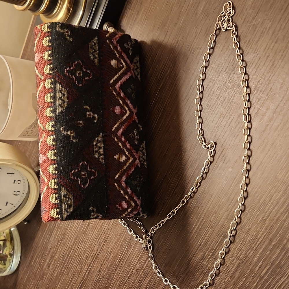 Hand Clutch with Silver Strap.